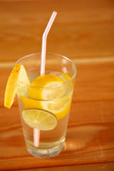 lemonade in a glass on wooden table