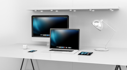 Modern white desk interior with computer and devices 3D renderin
