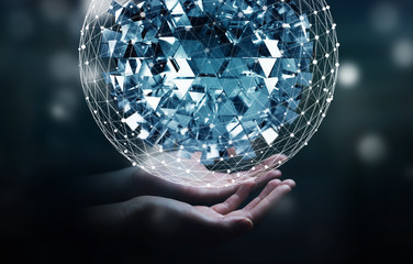 Businessman touching flying abstract sphere with shiny cube 3D r