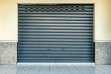 Old gray roller shutter door