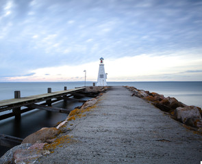 Fototapeta na wymiar Lighthouse at the harbor in Bogense