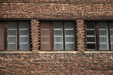 Old windows on industrial building near Sarajevo , Bosnia and Herzegovina