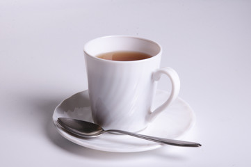 white mug of hot tea
