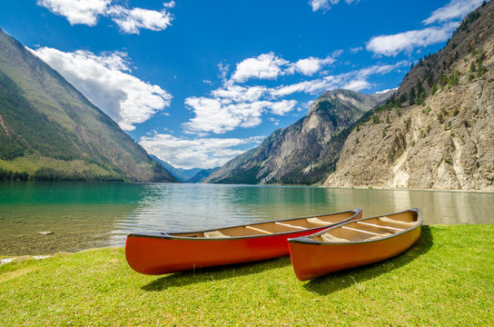 Mountain lake and boats. Seton Lake in Lillooet, Vancouver, Canada. Beauty world.