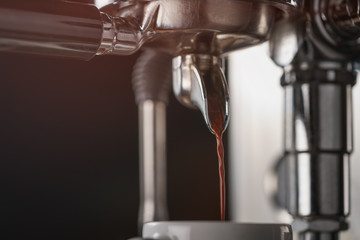 closeup photo of preparing espresso with coffee machine