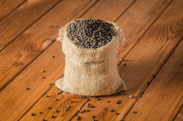 black pepper peas on sacking material background