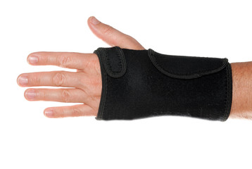 Wrist support with hand isolated on white.