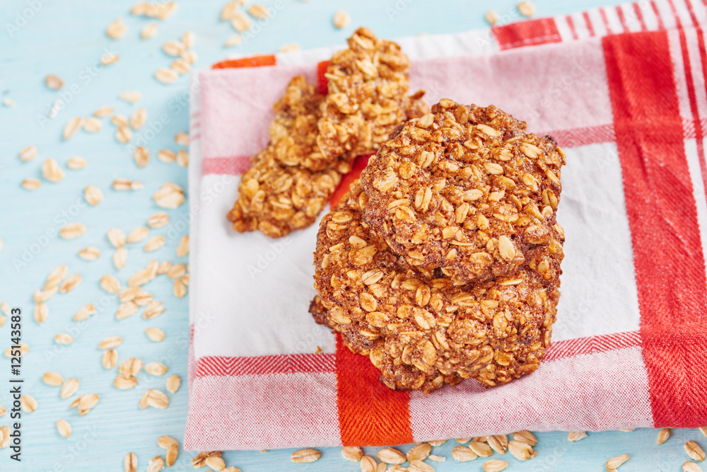 Wall mural homemade oatmeal banana cookies resting on napkin