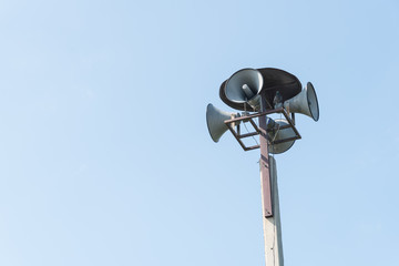 Megaphone Loudspeaker Post in Clear Blue Sky Background