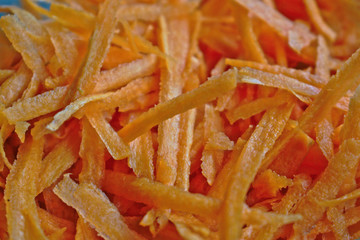 A closeup of grated carrots for background/texture