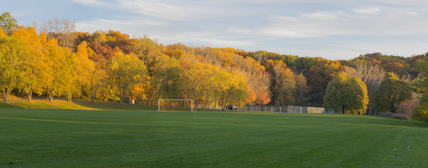 Panoramic soccer field at autumn season © milen69