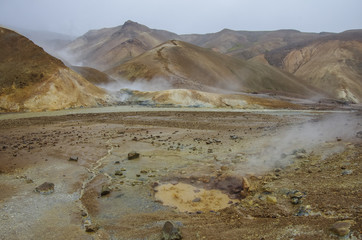 Kerlingarfjoll or The Ogress' Mountains, a volcanic mountain range situated in the highlands of Iceland. Steam from inside the earth