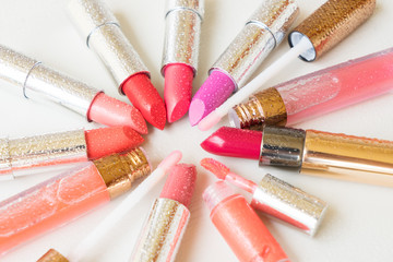 set of wet coloful lipsticks close up