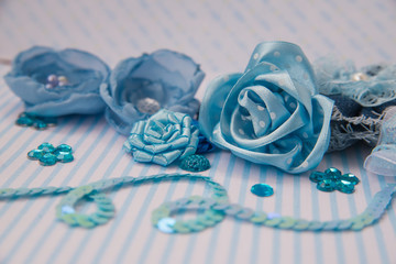 textile flowers and rhinestones