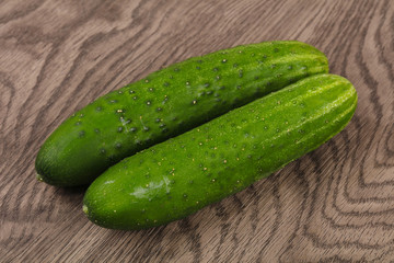 Two green cucumbers