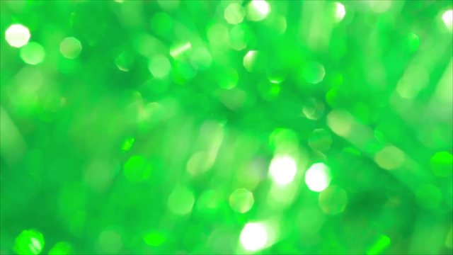 Green bokeh Christmas background. Defocused lights. 