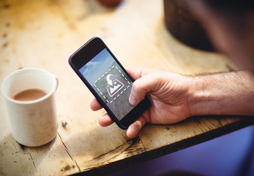 Smartphone and Coffee Cup Mockup