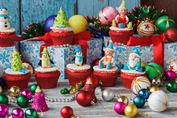 Christmas cupcakes with colored decorations