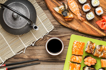Asian food, sushi rolls, nigiri, maki with soy sauce