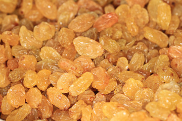 Golden Raisins close up. Healthy eating concept
