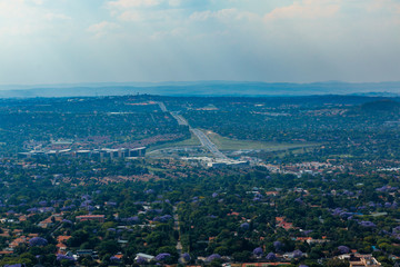 Looking up to the Northcliff Reservoir with Clouds behind the water tower Center screen