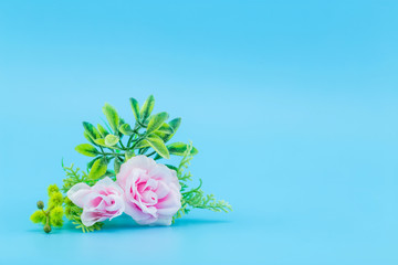 Bouquet of beautiful fresh flower artificial on blue background