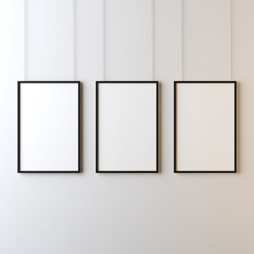 Three White posters with black frame Mockup hanging on the wall, 3d rendering