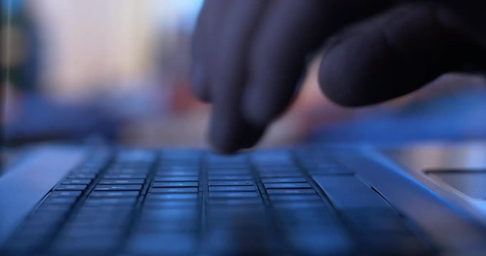 Professional Business person working typing on laptop PC computer keyboard