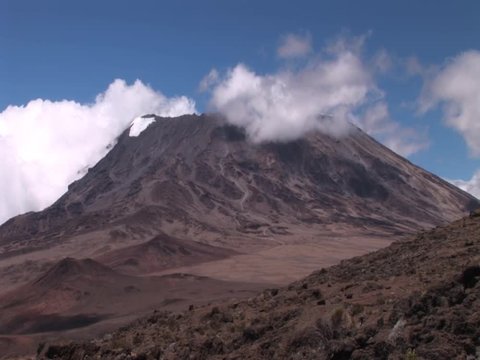Time Lapse.Mt. Kilimanjaro, with 5.895 m Uhuru Peak Africas highest mountain as well as worlds highest free-standing mountain. One of World`s Largest Volcanoes. Video shot with an old camera.