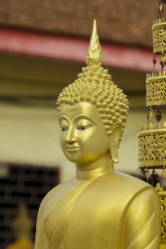 Image of golden buddha statue in temple in province tak. Thailand