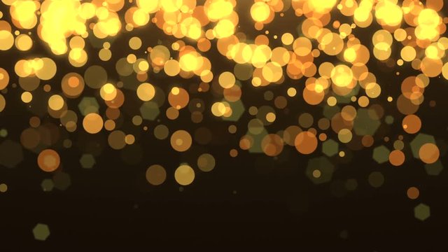 Falling, gold holiday bokeh on black for use as a Christmas background or other seasonal design elements. Video is looped for buyer convenience..
