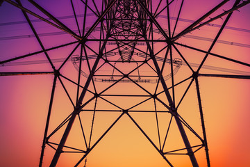 High voltage power tower beautiful scenery at sunset