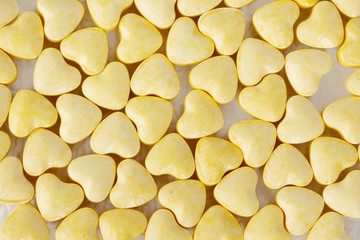 Yellow heart shaped pills - studio shoot