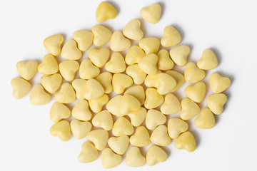 Yellow heart shaped pills - studio shoot

