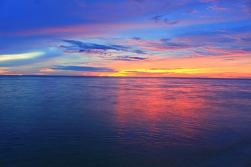 Fototapeta na wymiar Sunrise morning time before. Colorful sky and water in lake reflex.