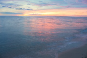Fototapeta na wymiar Sunrise morning time before. Colorful sky and water in lake reflex.