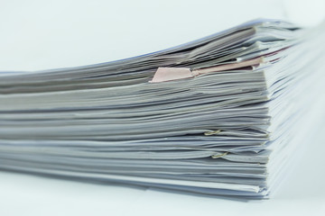 Stack of business report paper files