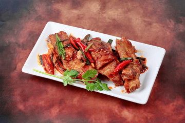 Fried pork spare ribs with grilled chili curry.