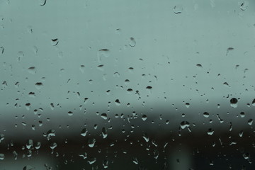 Blurred water drops on window.