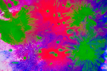 Multicolored paint stains, drips, splashes, mixing. Abstract background