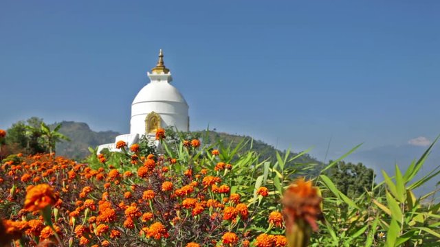 Balanced on a narrow ridge high above Phewa Tal, the brilliant-white World Peace Pagoda in Pokhara is a massive Buddhist stupa. Spectacular views of the Annapurna range and Pokhara city.