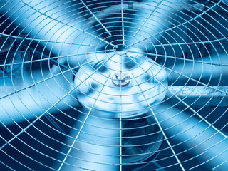 Fototapeta Blue tone of HVAC (Heating, Ventilation and Air Conditioning) spining blades / Closeup of ventilator / Industrial ventilation fan background / Air Conditioner Ventilation Fan / Ventilation system obraz