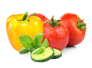 Composition of fresh vegetables on white background, closeup.