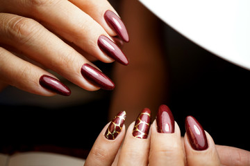 Awesome nails and beautiful clean manicure. Nails are natural. Manicure is made using nails drill machine.