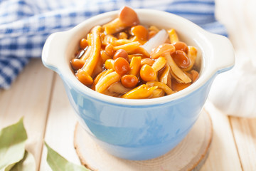 mushrooms in a bowl on a table, selective focus