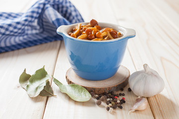 mushrooms in a bowl on a table, selective focus