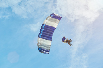 man on paraglider
