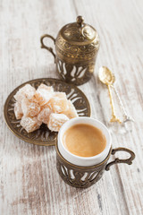 coffee and the Turkish delight  on a table, selective focus