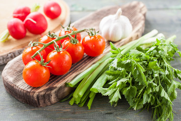 fresh vegetables on a wooden background, selective focus