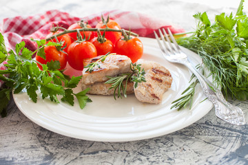 meat a grill in a plate on a table, selective focus